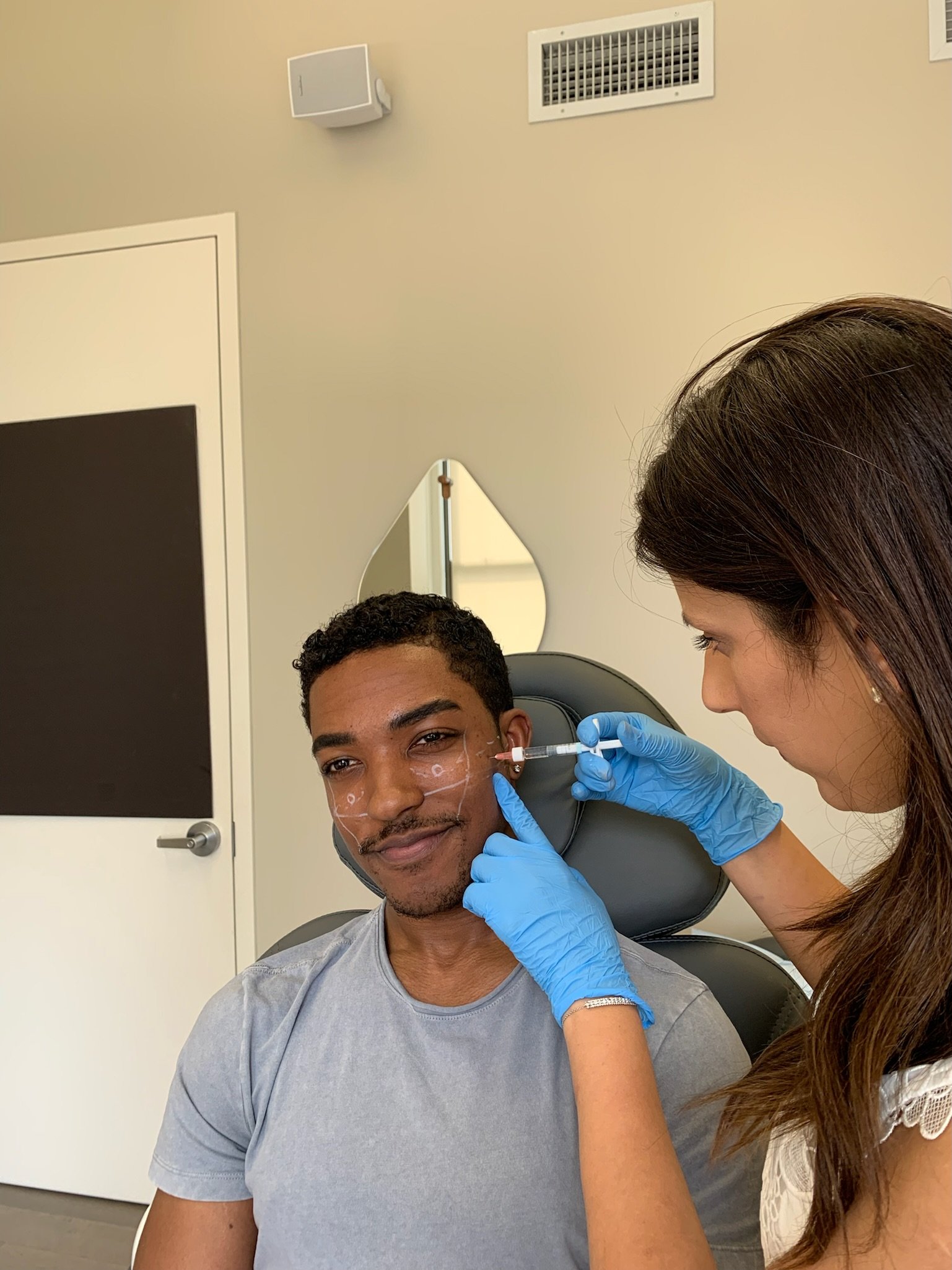 Physician administering Botox in NYC